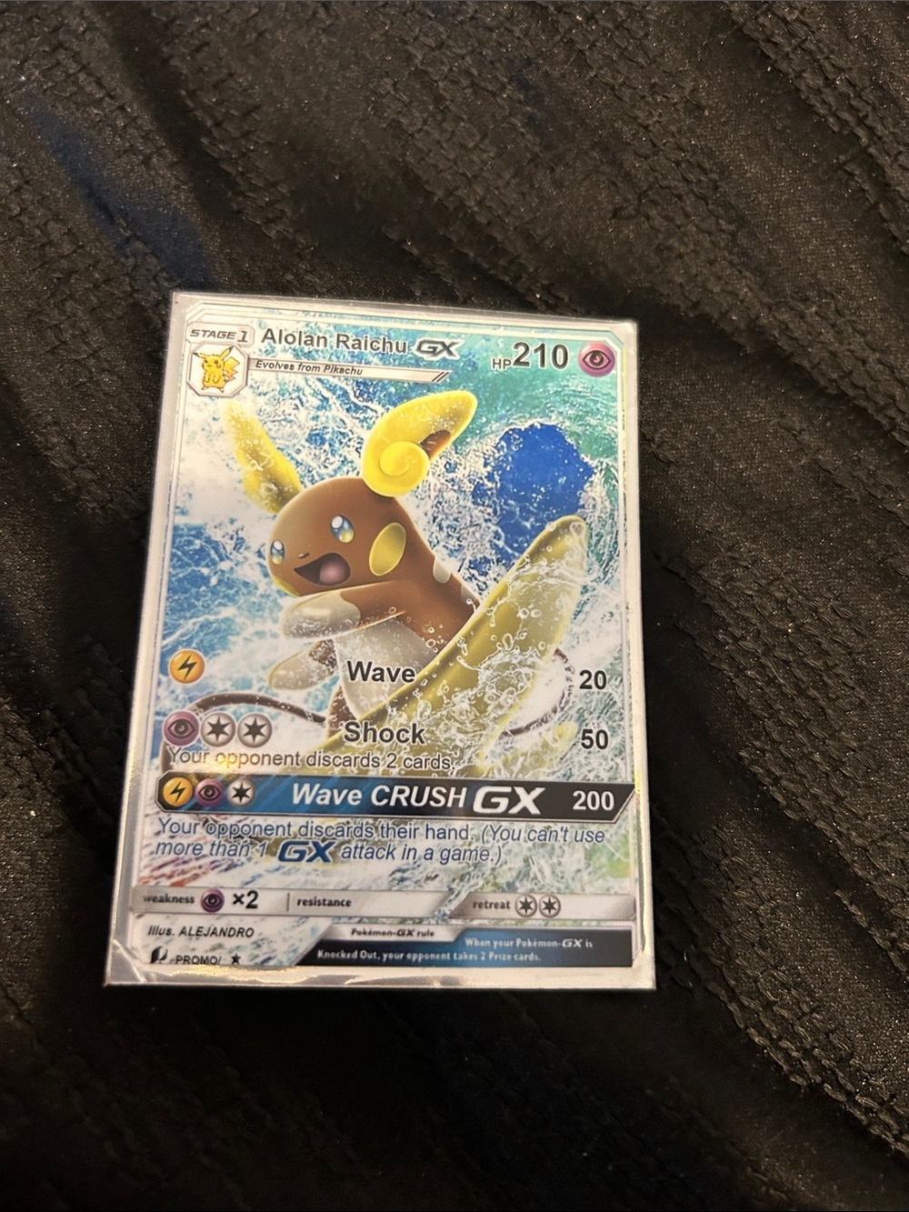 Pokemon Alolan Raichu GX Card - Yellow and Brown Artwork